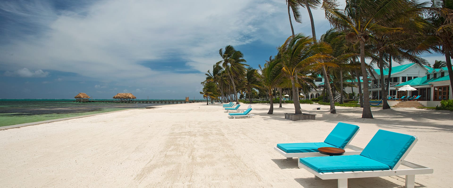 Long white sand beach at Victoria House Resort and Spa