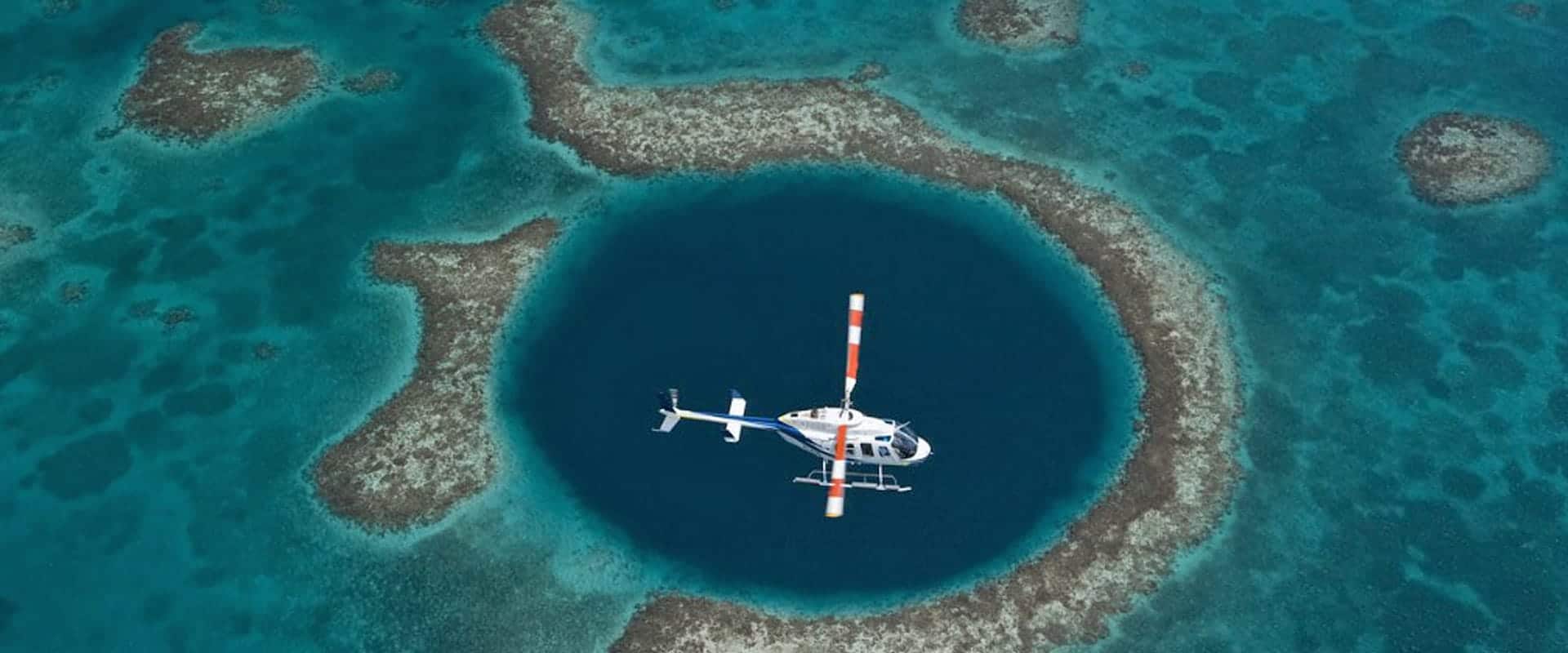 Helicopter aerial tours over the Great Blue Hole offered at Victoria House Resort and Spa