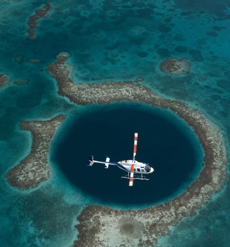 Helicopter aerial tours over the Great Blue Hole offered at Victoria House Resort and Spa