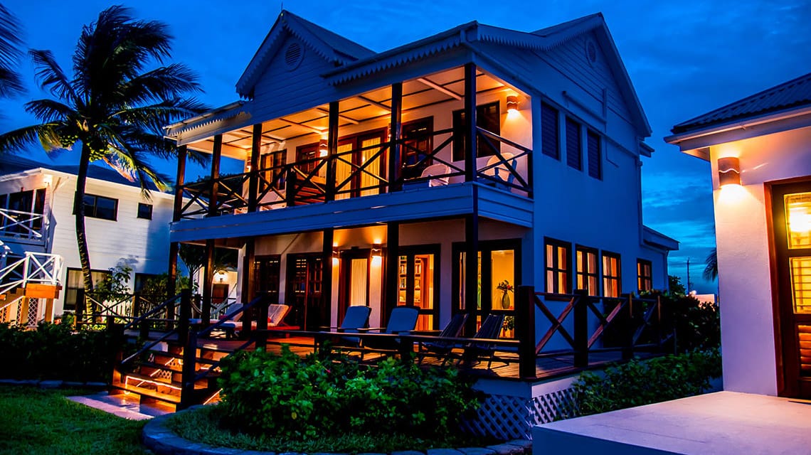 Exterior of Casa Del Sol at night at Victoria House Resort and Spa, Belize