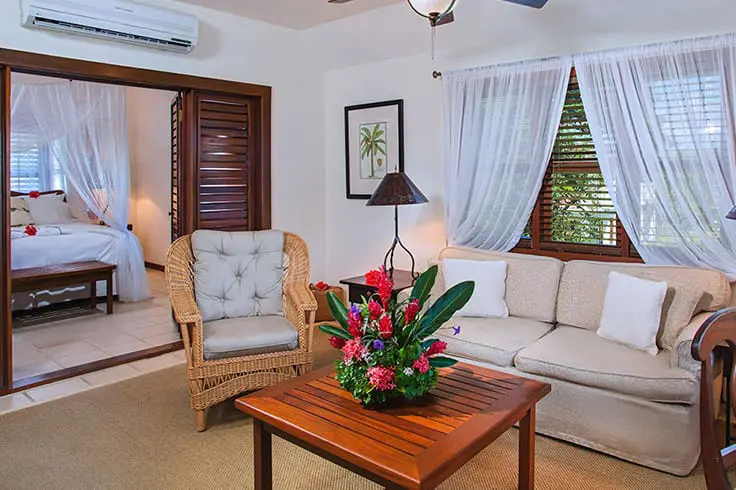 Living room of Coral & Hibiscus Suite at Victoria House Resort and Spa