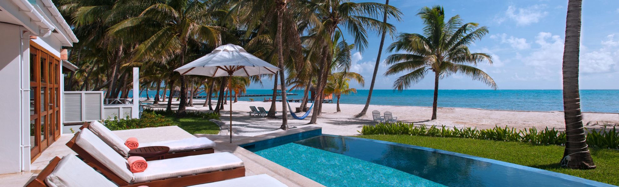 Infinity pool at Casa Playa Blanca overlooking Caribbean Sea at Victoria House Resort and Spa, Belize