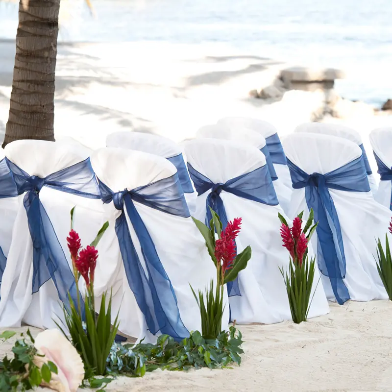 Wedding decorations on the beach at Victoria House Resort and Spa